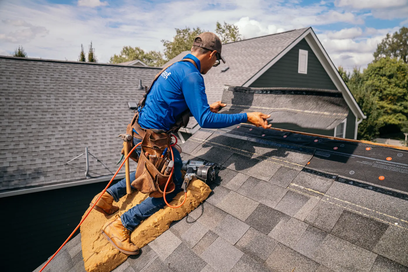 Tarping and dry-in on a Crooked Creek commercial roof